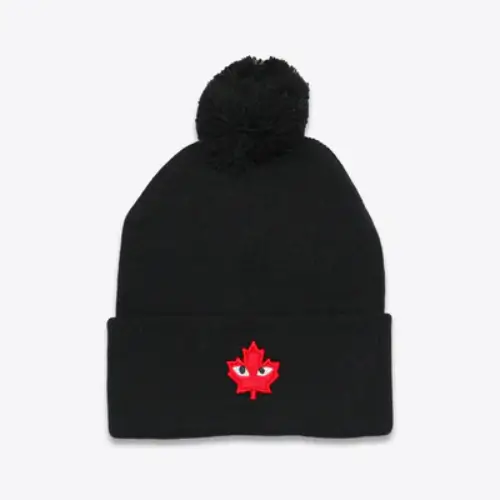 CDG POM POM BEANIE BLACK CDG POM POM BEANIE BLACK Front Side View With Canadiam Emblem